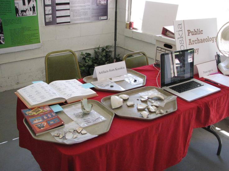 Artifacts on display from the 2013 field season and a PowerPoint presentation displaying finds from the 2010 field season